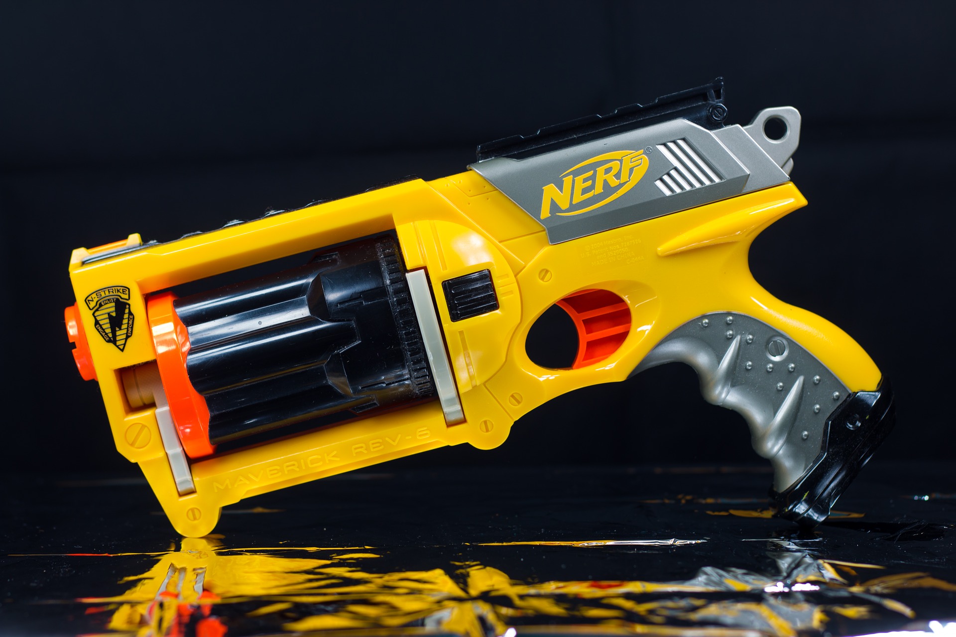 Image of a yellow NERF toy gun.