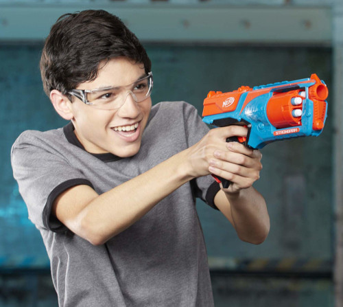 Image of boy with NERF gun. 