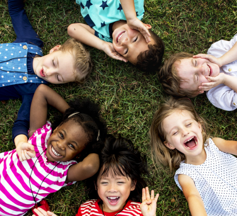 Preschool children on grass