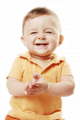 Image of a baby clapping. 