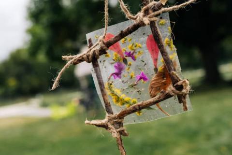 Image of suncatcher made with items from nature.