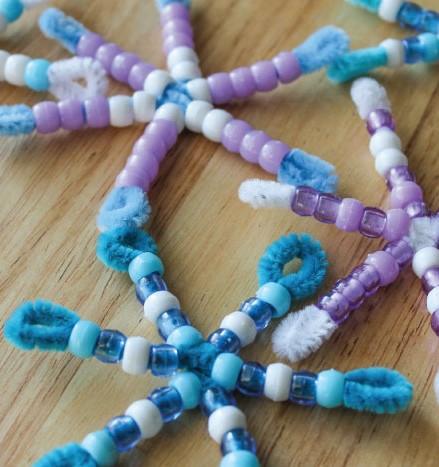 Image of snowflake made out of chenille stems and pony beads