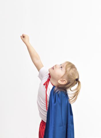 Profile image of young girl wearing blue cape.