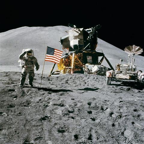 Image of astronaut from Apollo 11 mission, standing on the moon.