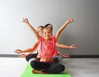 Tweens in yoga class